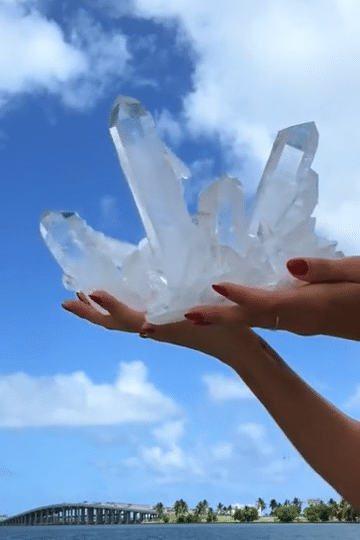 An_incredible_9lb_Clear_Quartz_cluster_from_Brazil_a_true_interior_statement_piece._Known_as-low.gif