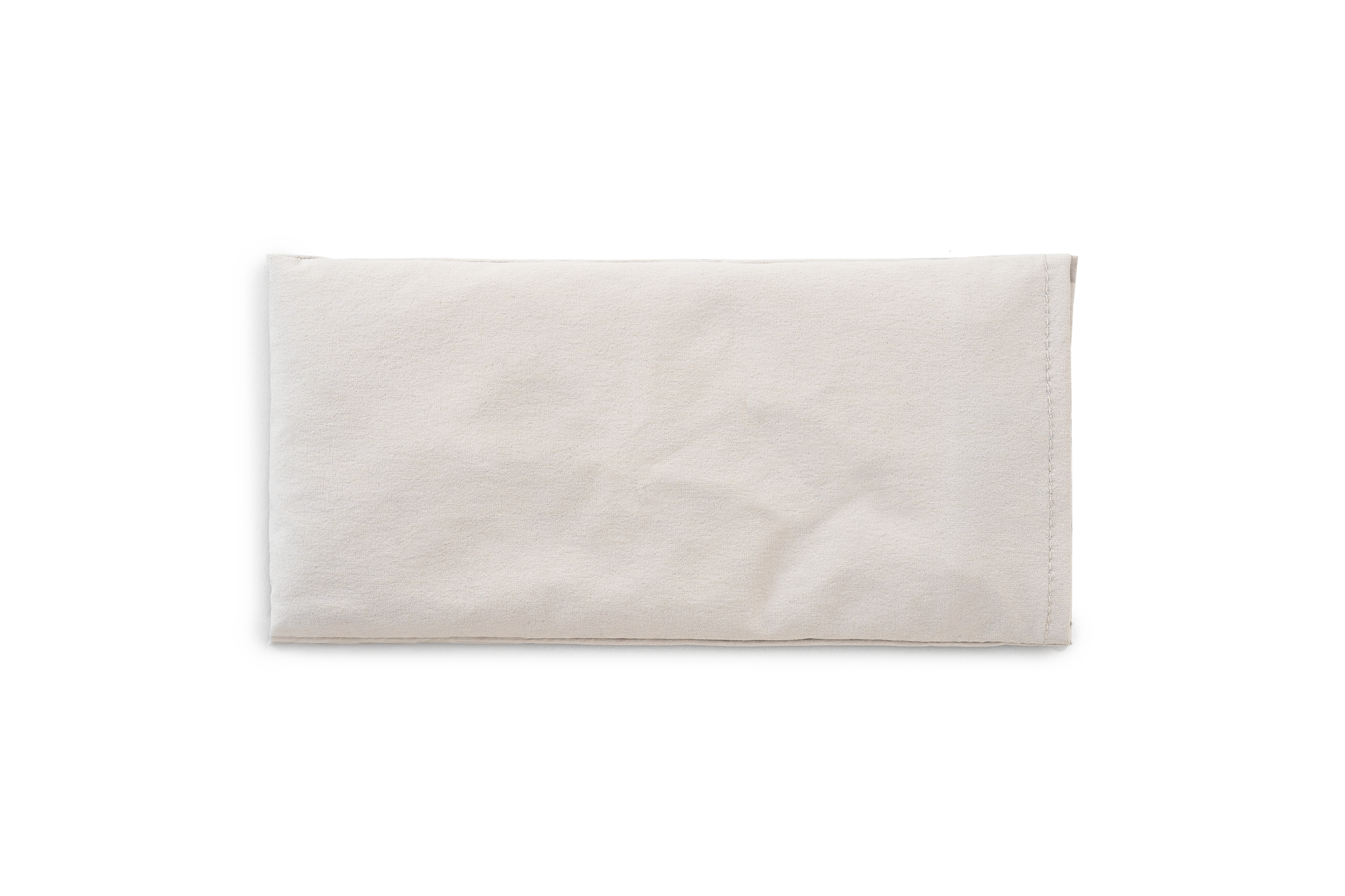 A green weighted eye mask on a white background.