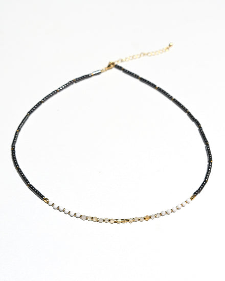 Clarity Necklace - Hematite, Howlite + Clear Quartz — Clear Quartz crystal specimen