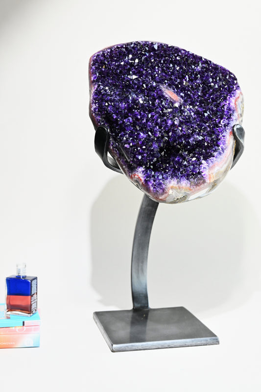 amethyst crystal geode on stand home decor