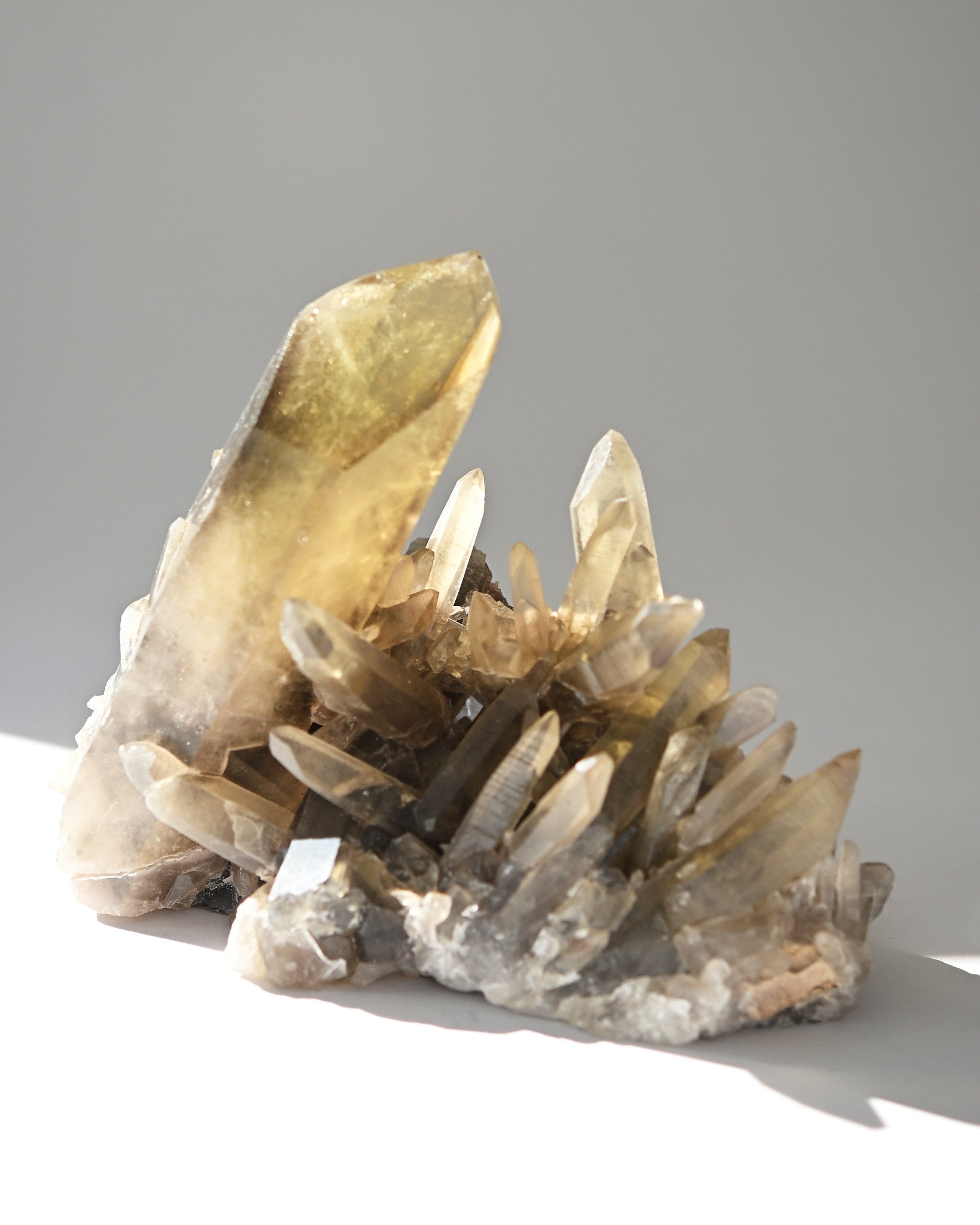 Cluster of crystal formations on a gray background