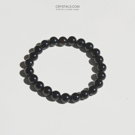 Black Onyx Bracelet - PROTECT — Clear Quartz crystal specimen