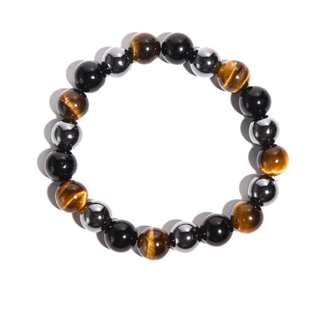 GROUNDED LUCK BRACELET - Tiger's Eye / Hematite / Obsidian — Hematite crystal specimen