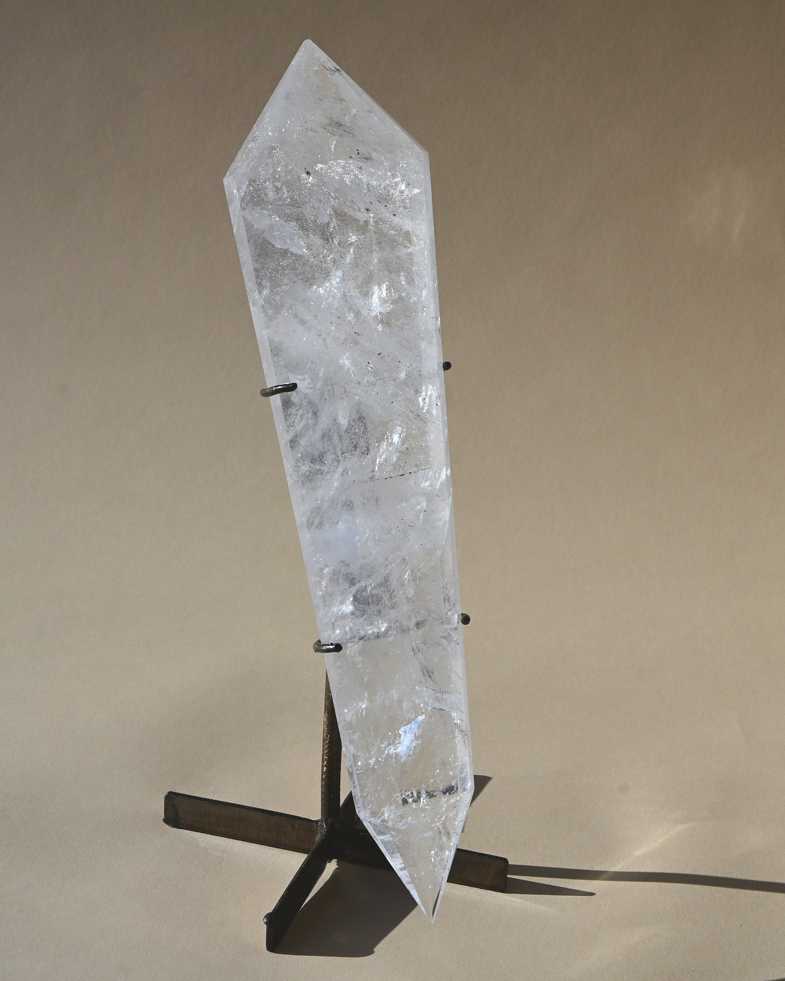 Clear Quartz Double Terminated Vogel on Stand - clear quartz crystal point side view