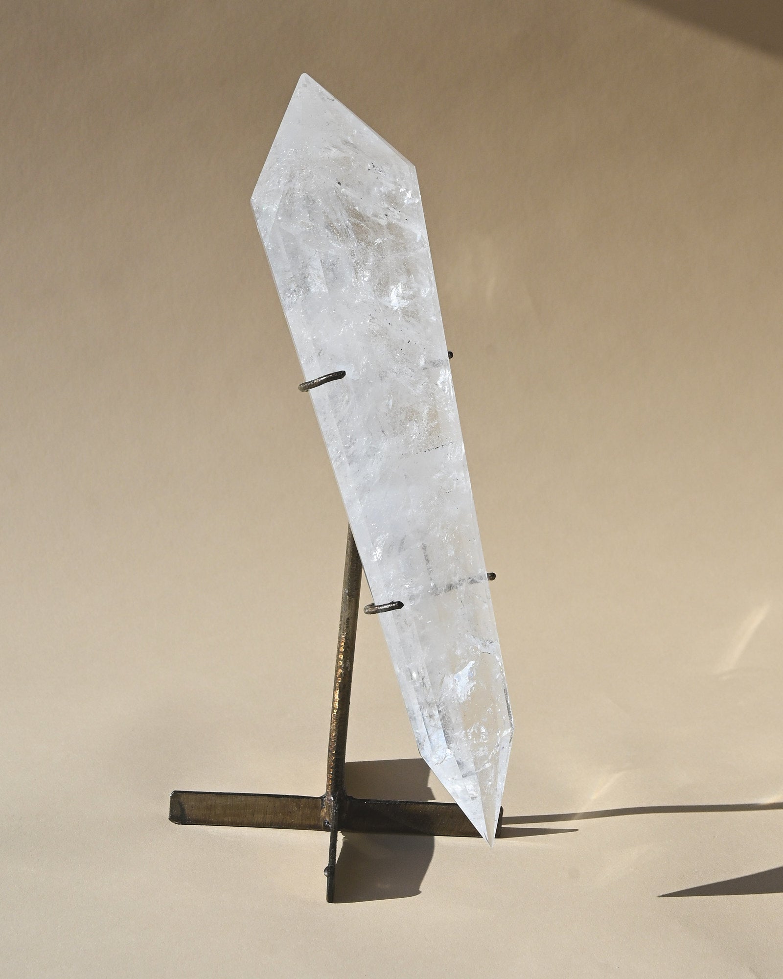 Clear Quartz Double Terminated Vogel on Stand - clear quartz crystal point in natural light