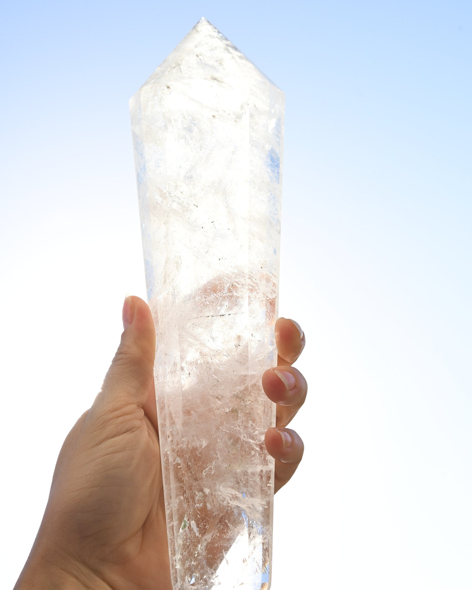 Clear Quartz Double Terminated Vogel on Stand - clear quartz crystal point styled in home