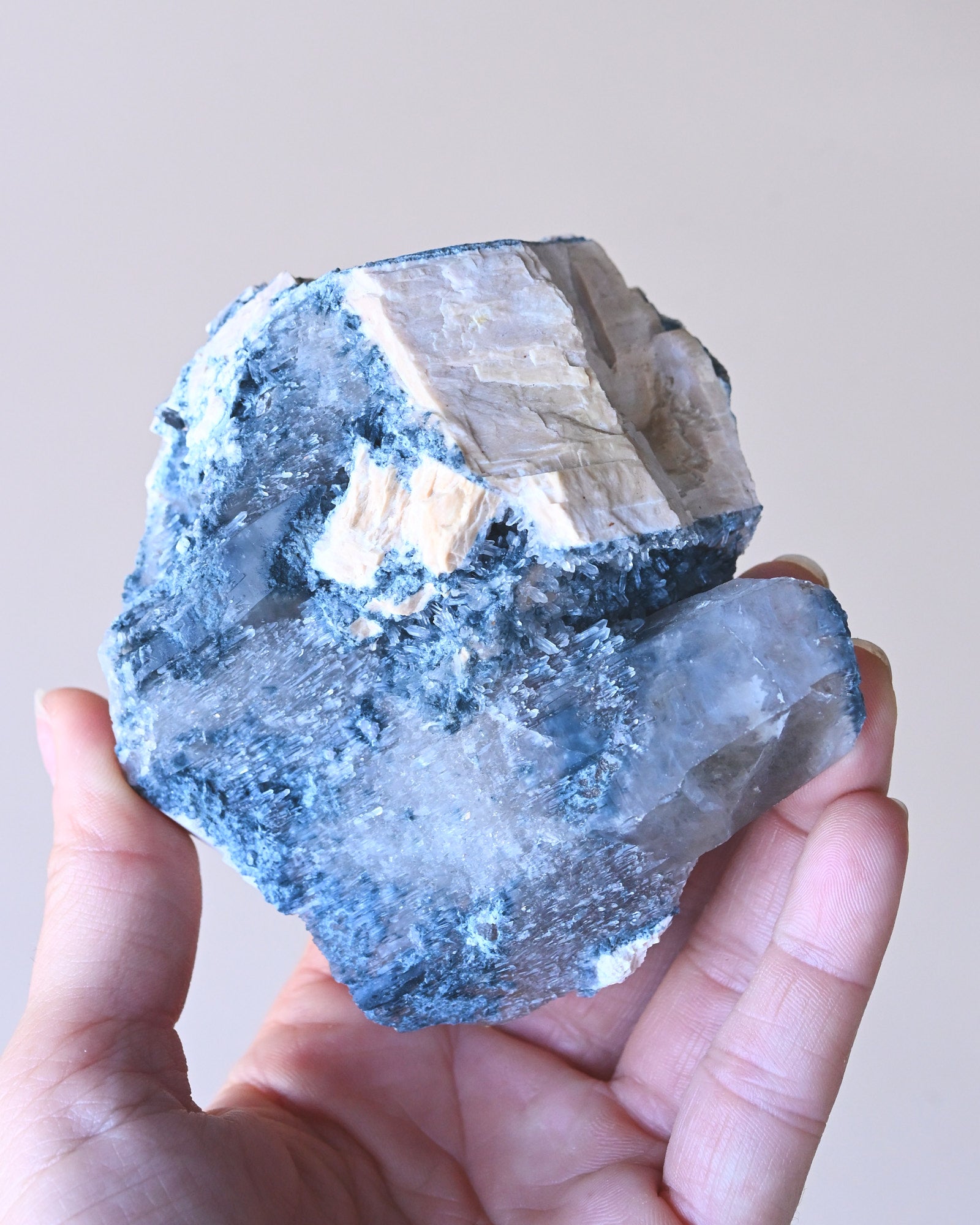 Foitite on Feldspar – Erongo Mountains, Namibia - smoky quartz crystal raw natural in natural light