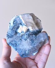 Foitite on Feldspar – Erongo Mountains, Namibia - smoky quartz crystal raw natural in natural light
