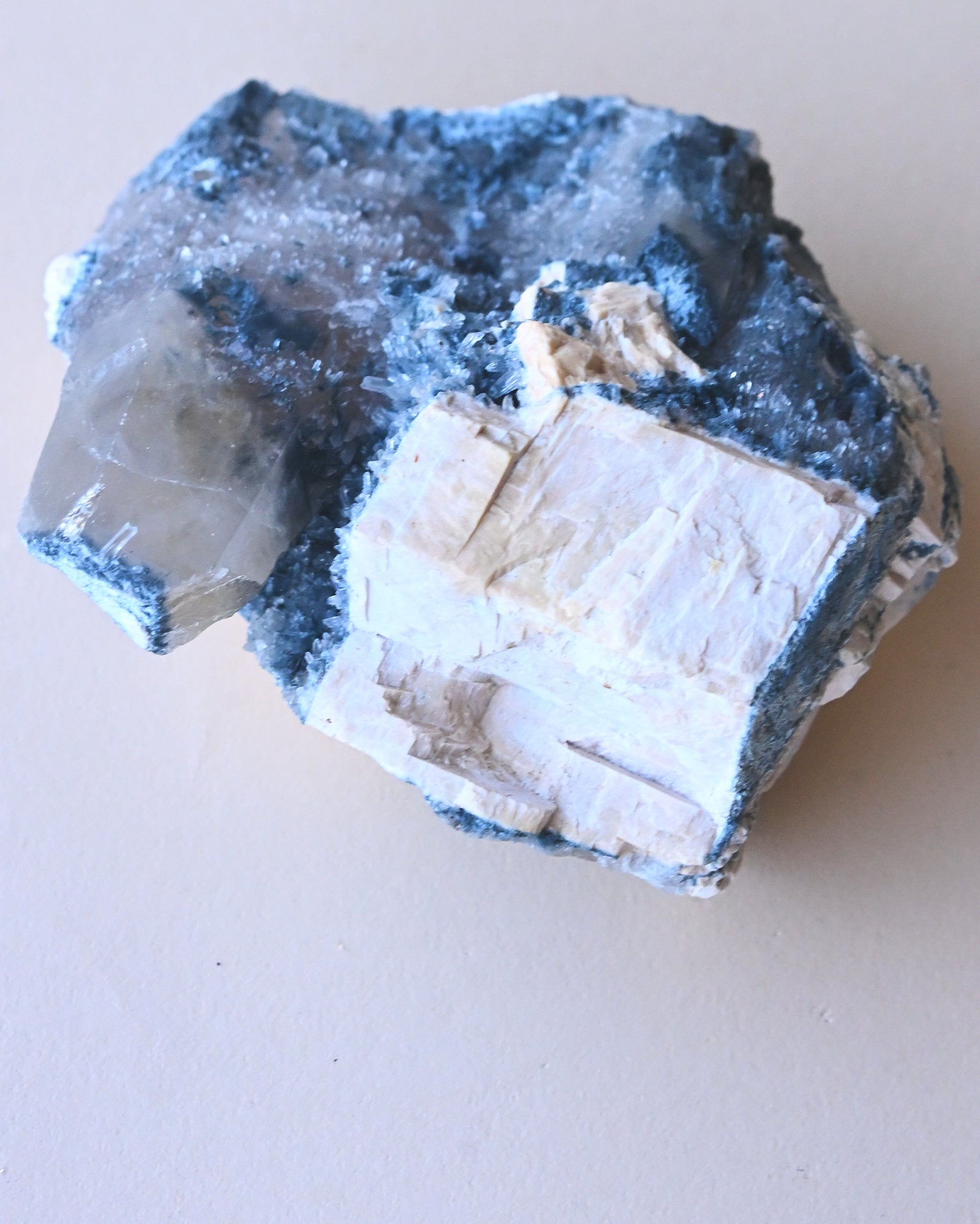Foitite on Feldspar – Erongo Mountains, Namibia - smoky quartz crystal raw natural scale view