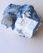 Foitite on Feldspar – Erongo Mountains, Namibia - smoky quartz crystal raw natural scale view