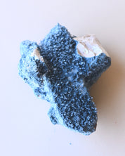 Foitite on Feldspar – Erongo Mountains, Namibia - smoky quartz crystal raw natural in natural light