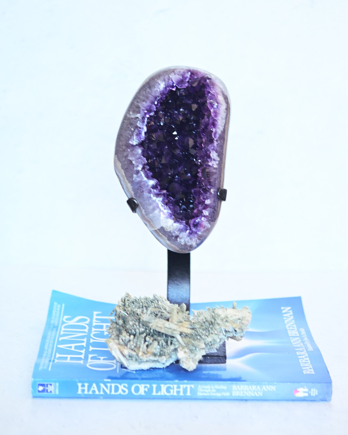 Amethyst Geode on Stand and Chlorite Himalayan Cluster styled together