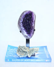 Amethyst Geode on Stand and Chlorite Himalayan Cluster styled together