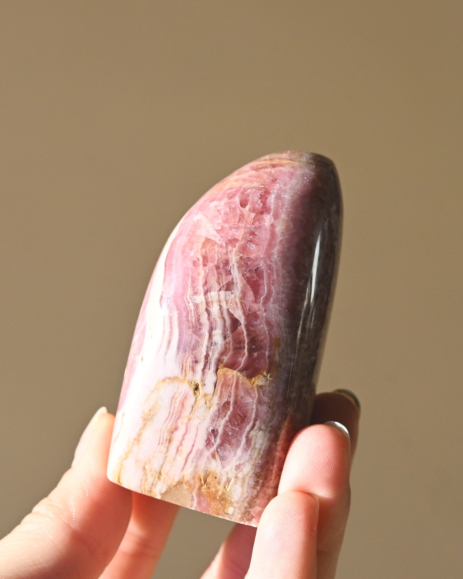 Rhodochrosite Polished Freeform - pyrite crystal freeform sculpture close up detail