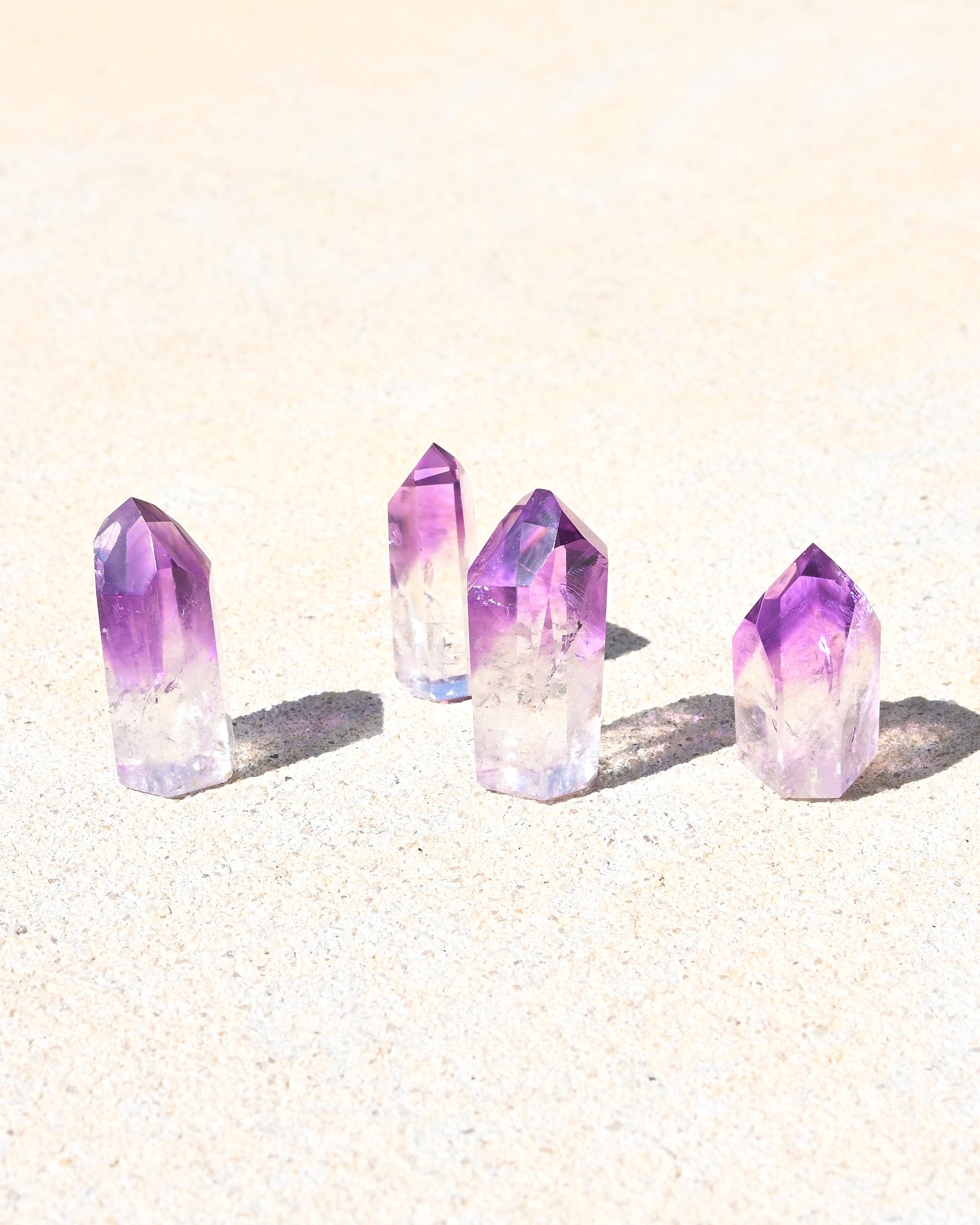 Mini Bahia Amethyst Phantom Point - natural amethyst crystal point styled in home