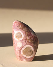 Rhodochrosite Polished Freeform 3in - pyrite crystal freeform sculpture for sale at Crystals.com