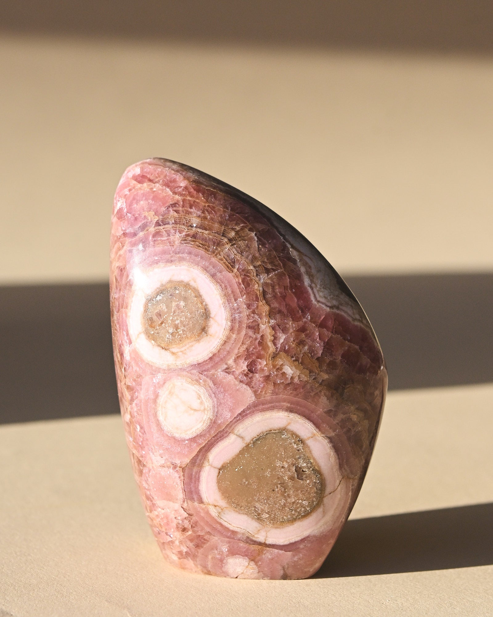 Rhodochrosite Polished Freeform 3in - pyrite crystal freeform sculpture close up detail