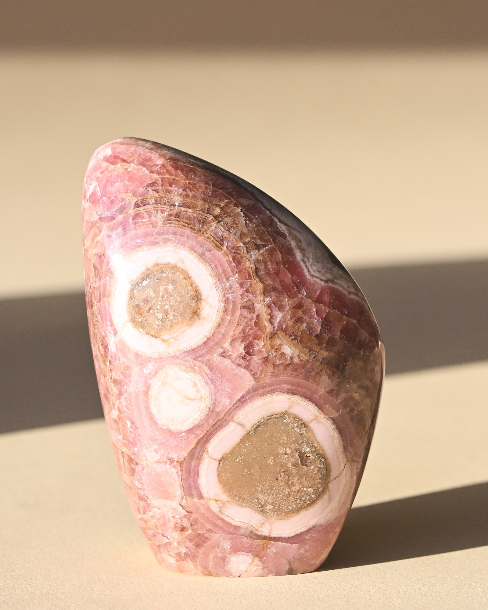 Rhodochrosite Polished Freeform 3in - pyrite crystal freeform sculpture side view