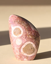 Rhodochrosite Polished Freeform 3in - pyrite crystal freeform sculpture side view