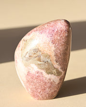 Rhodochrosite Polished Freeform 3in - pyrite crystal freeform sculpture scale view