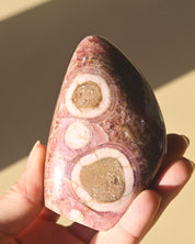 Rhodochrosite Polished Freeform 3in - pyrite crystal freeform sculpture styled in home