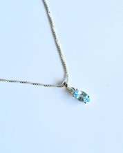 Blue Topaz Pendant in box — side view