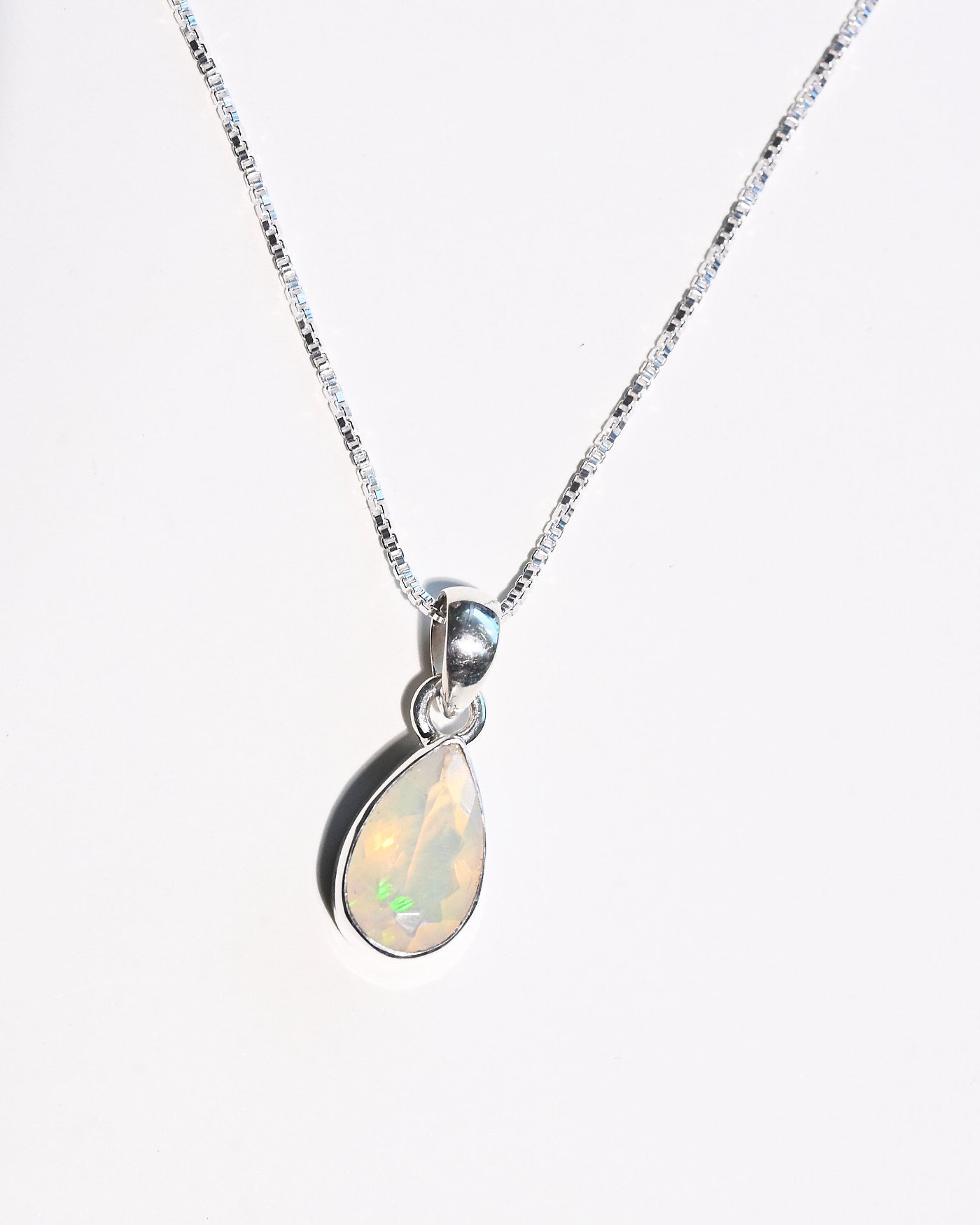 Opal teardrop pendant color play detail