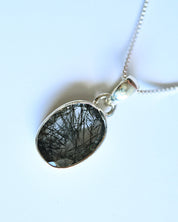Black Rutile Pendant — Sterling Silver — oval cabochon