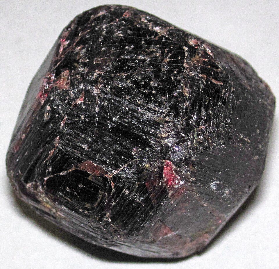 Garnet crystal — Red, green, orange specimen, Isometric crystal system