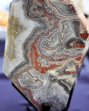 Red banded Agate slab on stand Brazil