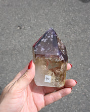 Rose quartz geometric point side view