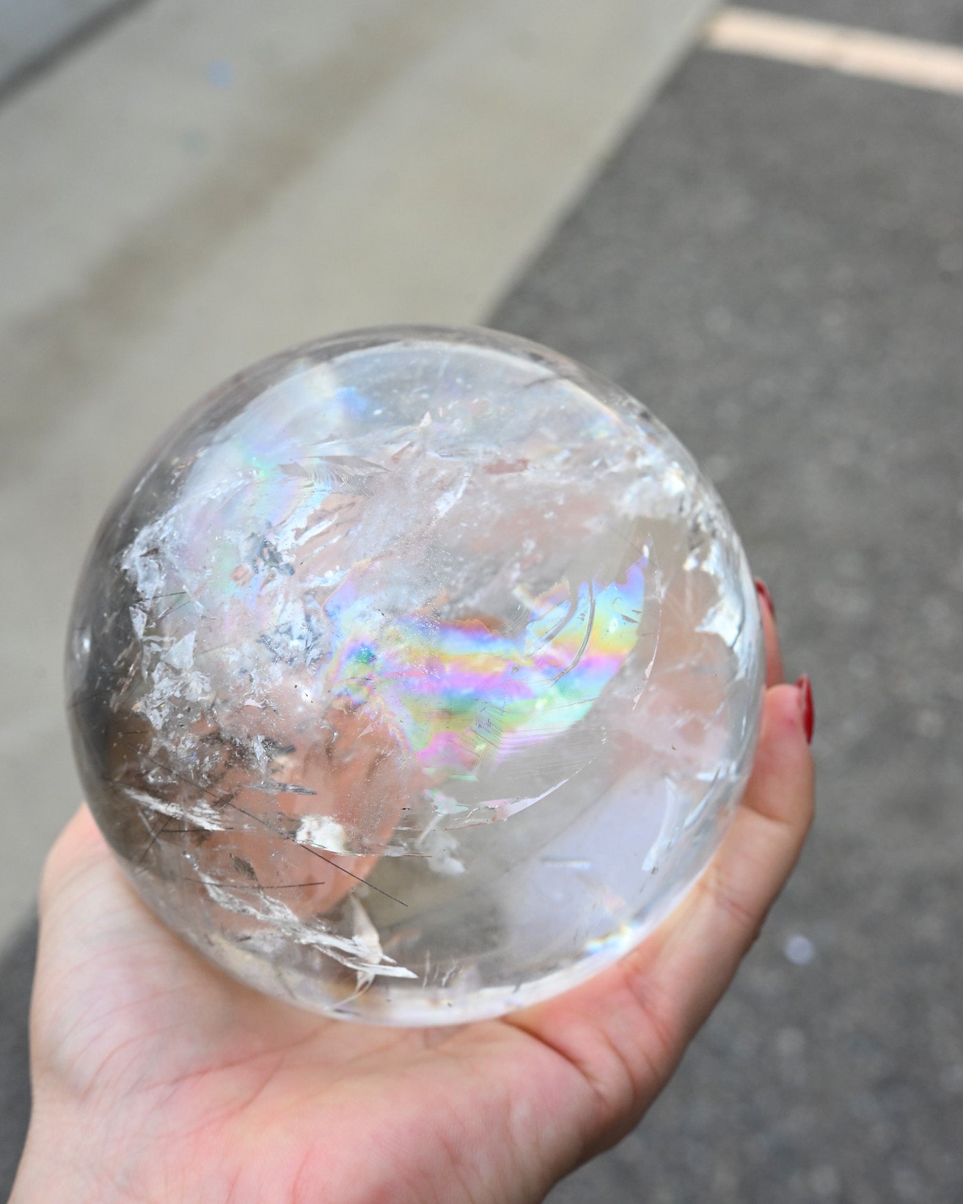 Rainbow rutile statement clear Quartz sphere Brazil