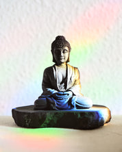 Buddha statue on a colorful background