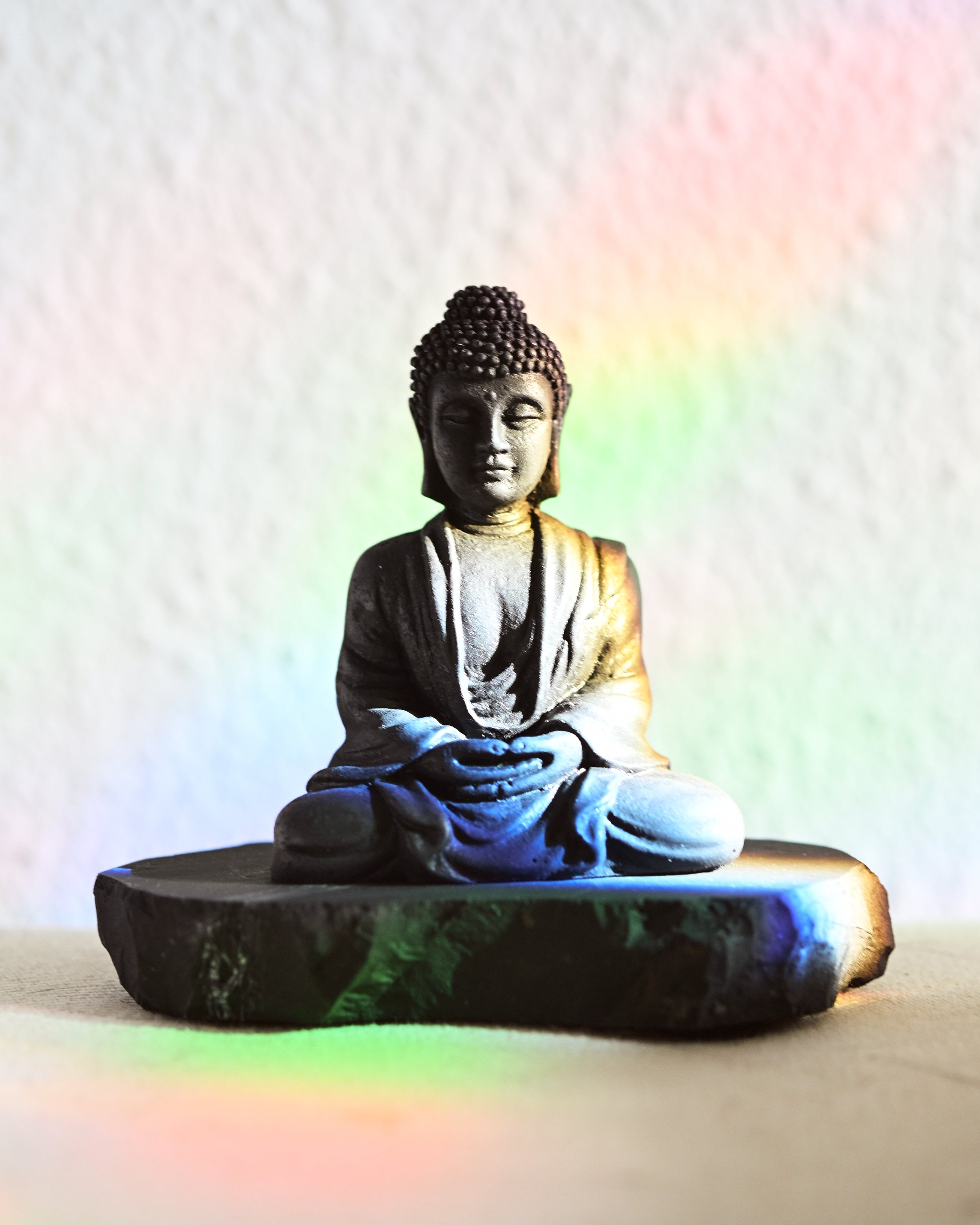 Buddha statue on a colorful background