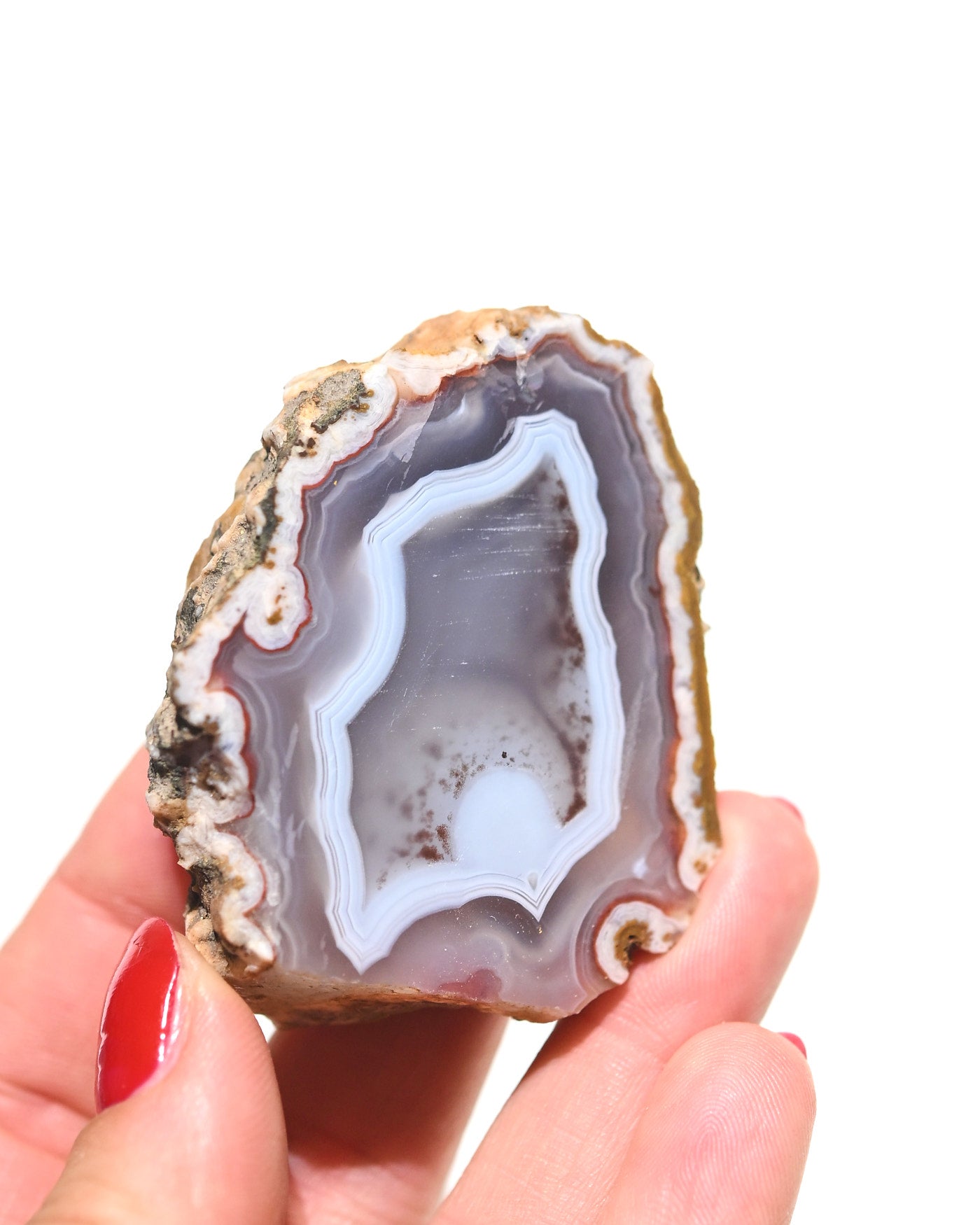 Moroccan agate geode hand scale view