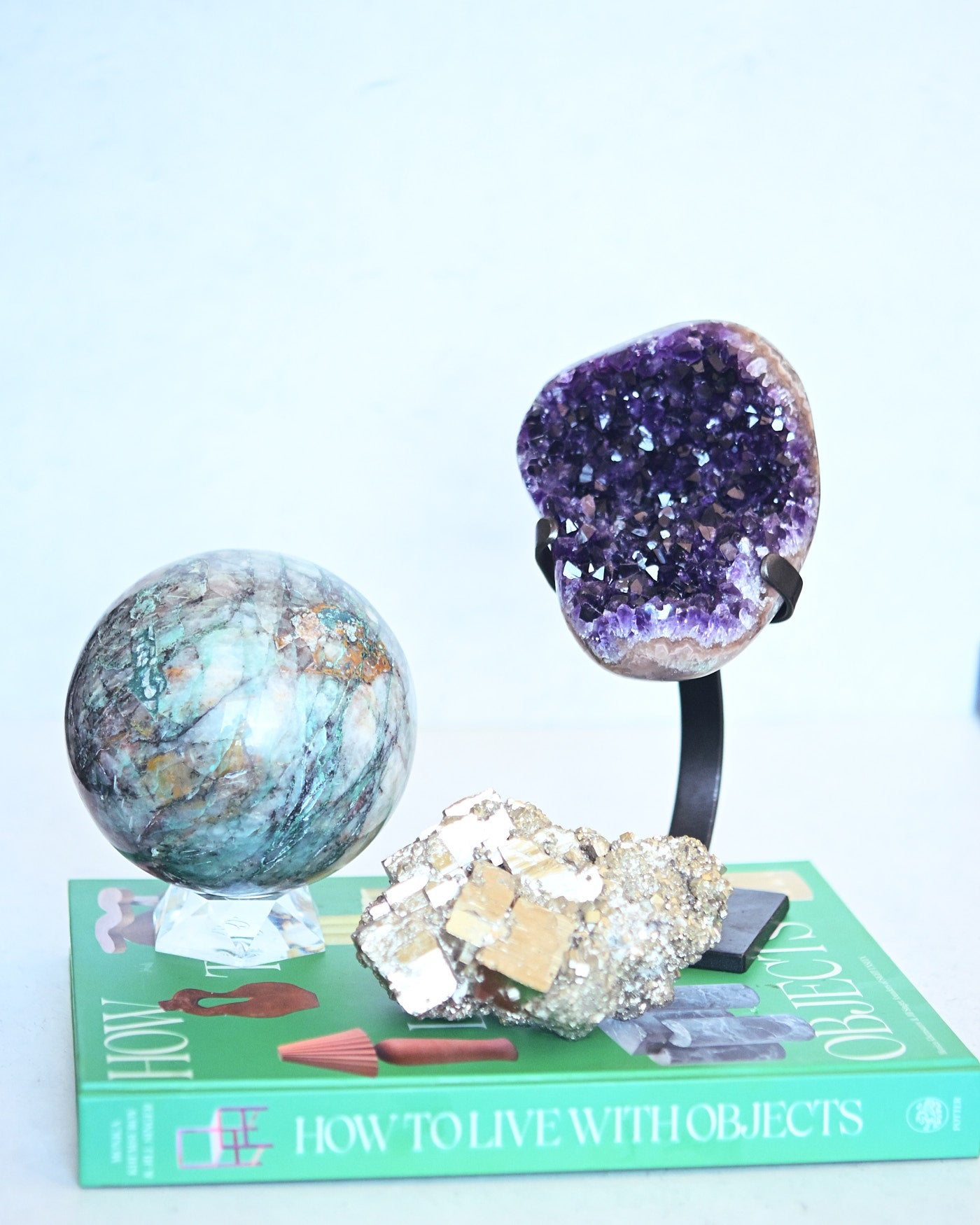 Three-piece mineral bundle styled on coffee table book