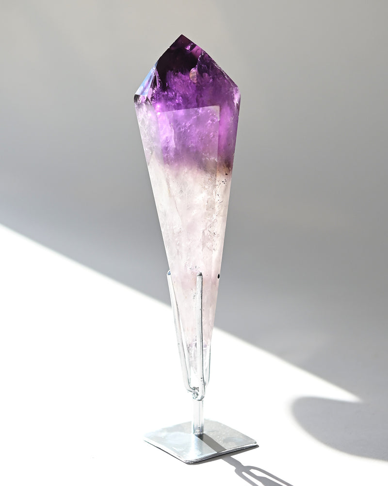 amethyst Crystal with purple and white gradient on a gray background