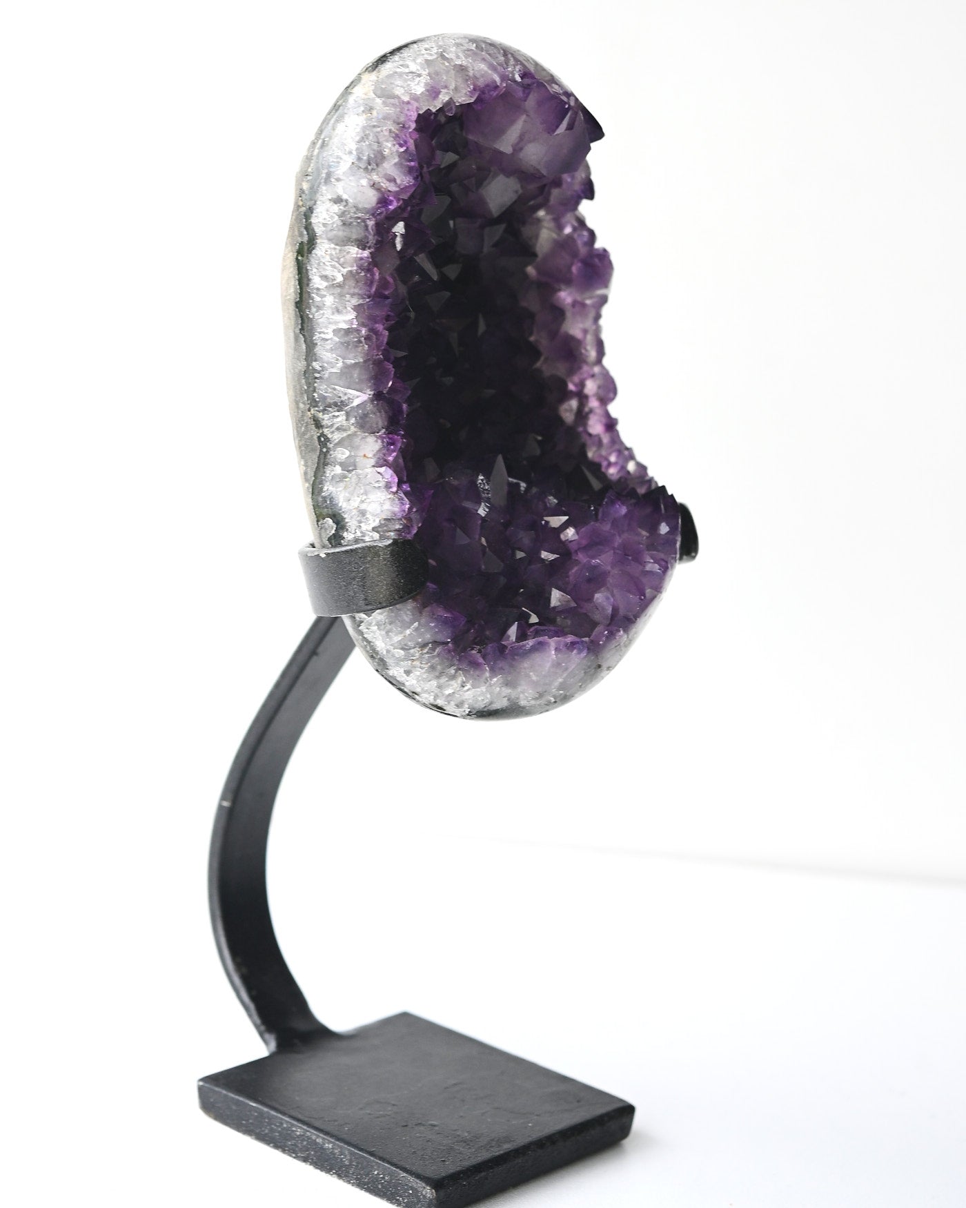 Amethyst geode side profile showing crystal cavity depth