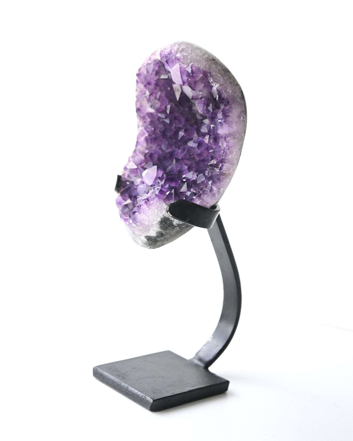 Amethyst geode specimen 896 grams on custom iron display stand