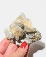 Barite Crystal Cluster Morocco 236g - in hand for scale