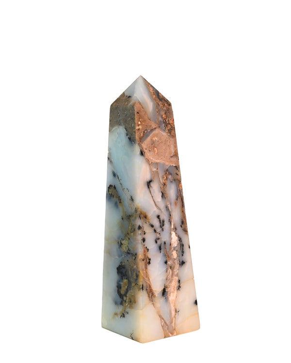 Marble obelisk with multicolored patterns on a white background