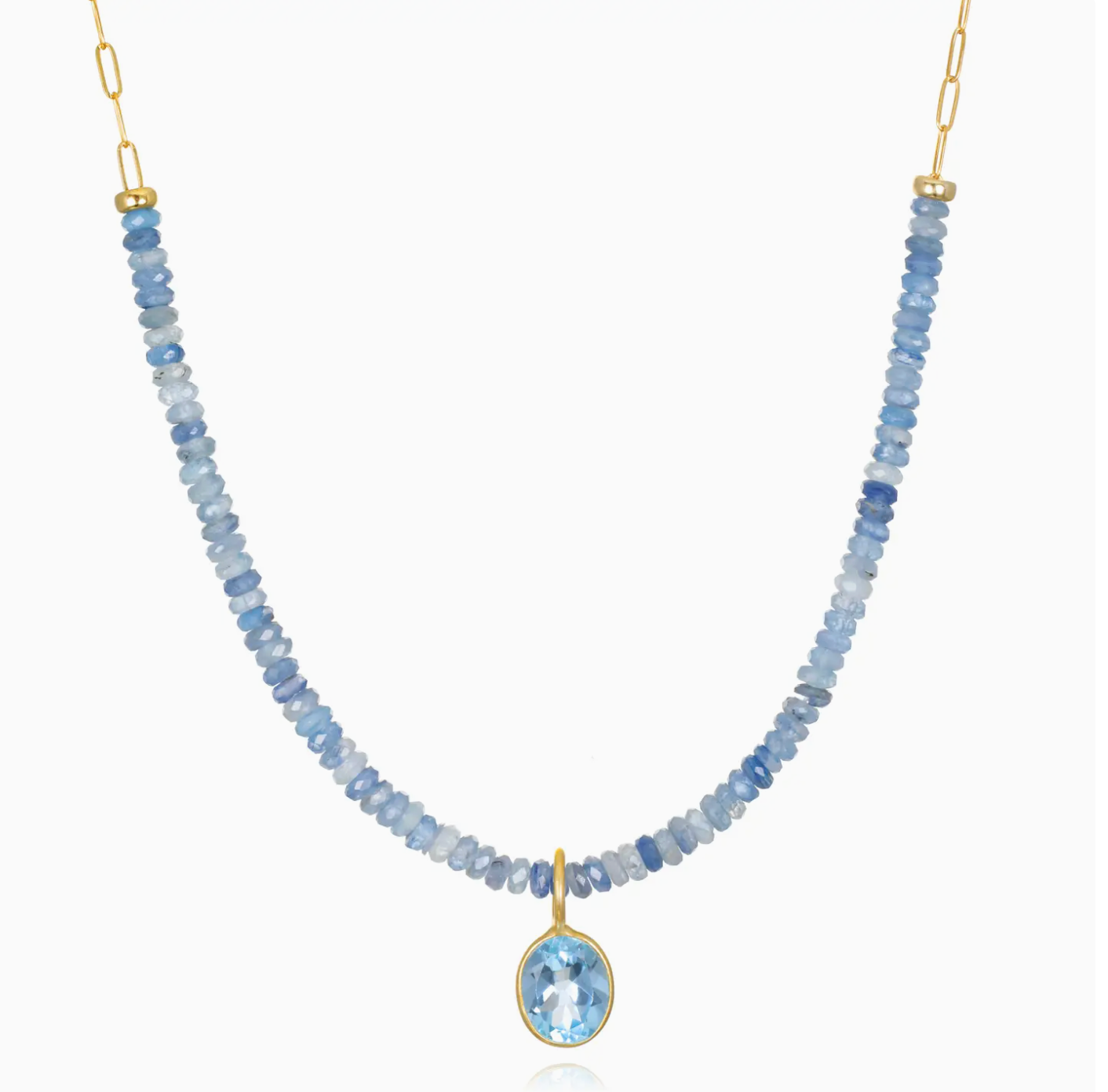 Necklace with blue beaded chain and gold pendant on a white background