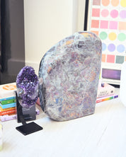 Crystal bundle showing scale of amethyst geode and 40lb labradorite freeform