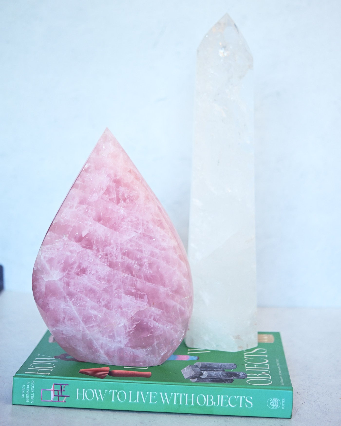 Statement rose quartz flame next to clear quartz tower - crystal collector bundle