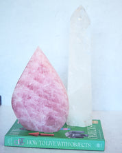 Statement rose quartz flame next to clear quartz tower - crystal collector bundle