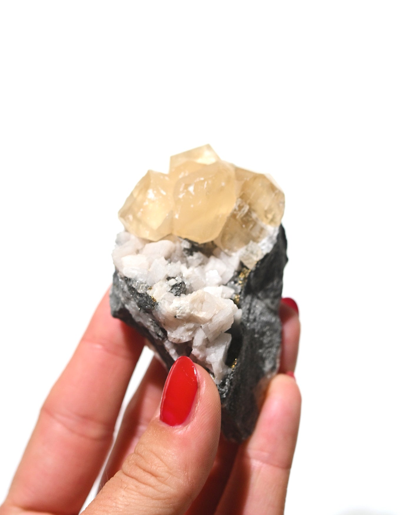 Raw calcite specimen from Canada, natural golden tones