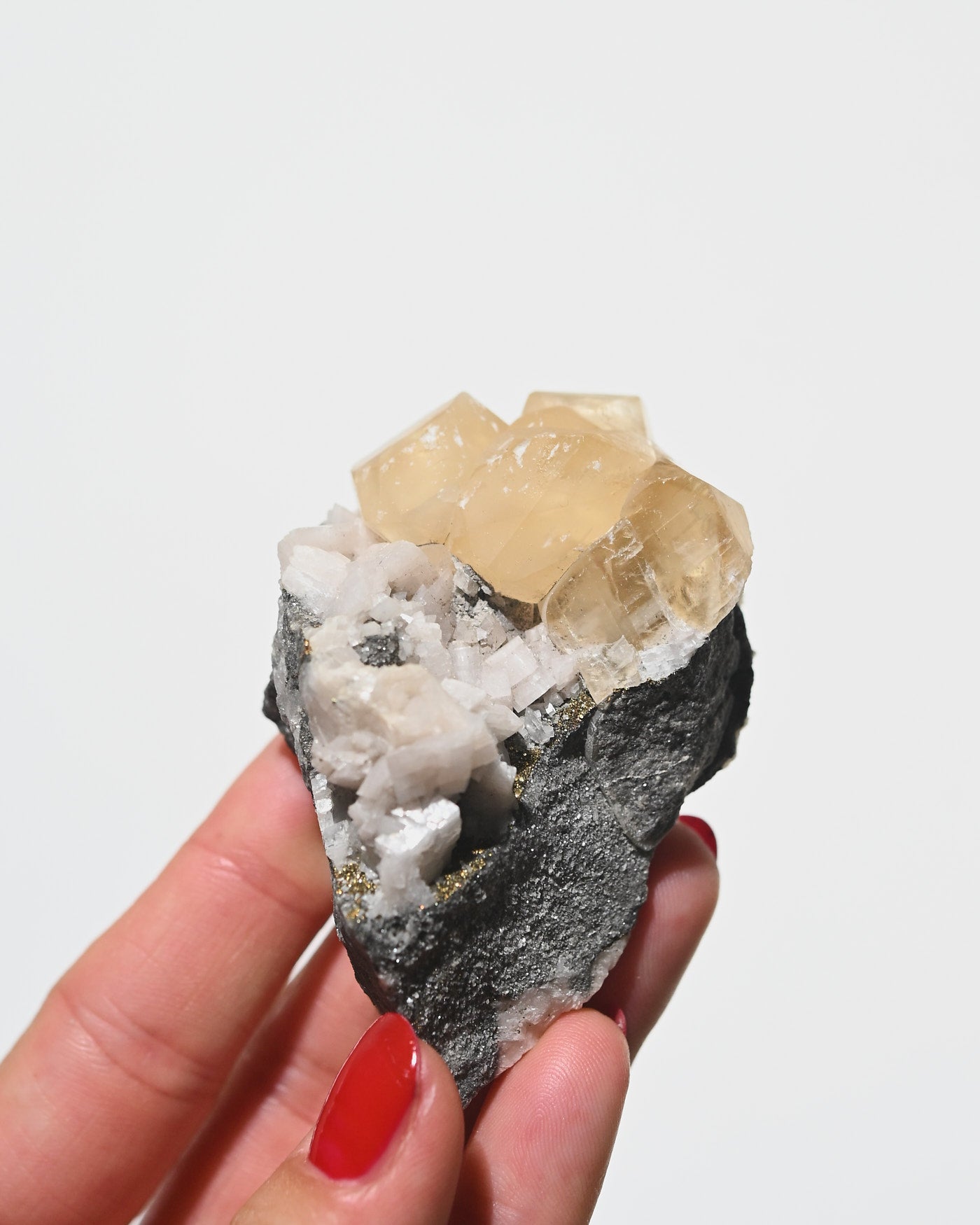 Calcite specimen close-up, transparent honey calcite crystals