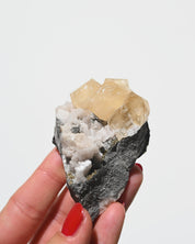 Calcite specimen close-up, transparent honey calcite crystals