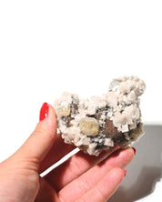 Calcite with Dolomite showing honey calcite crystals on white matrix