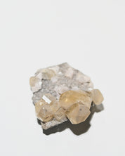 Raw calcite specimen from Canada, sharp crystal terminations